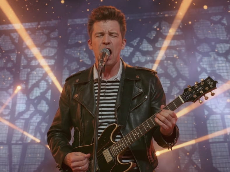 Singer Rick Astley performing with a guitar, demonstrating AI's ability to generate new art from an existing image.